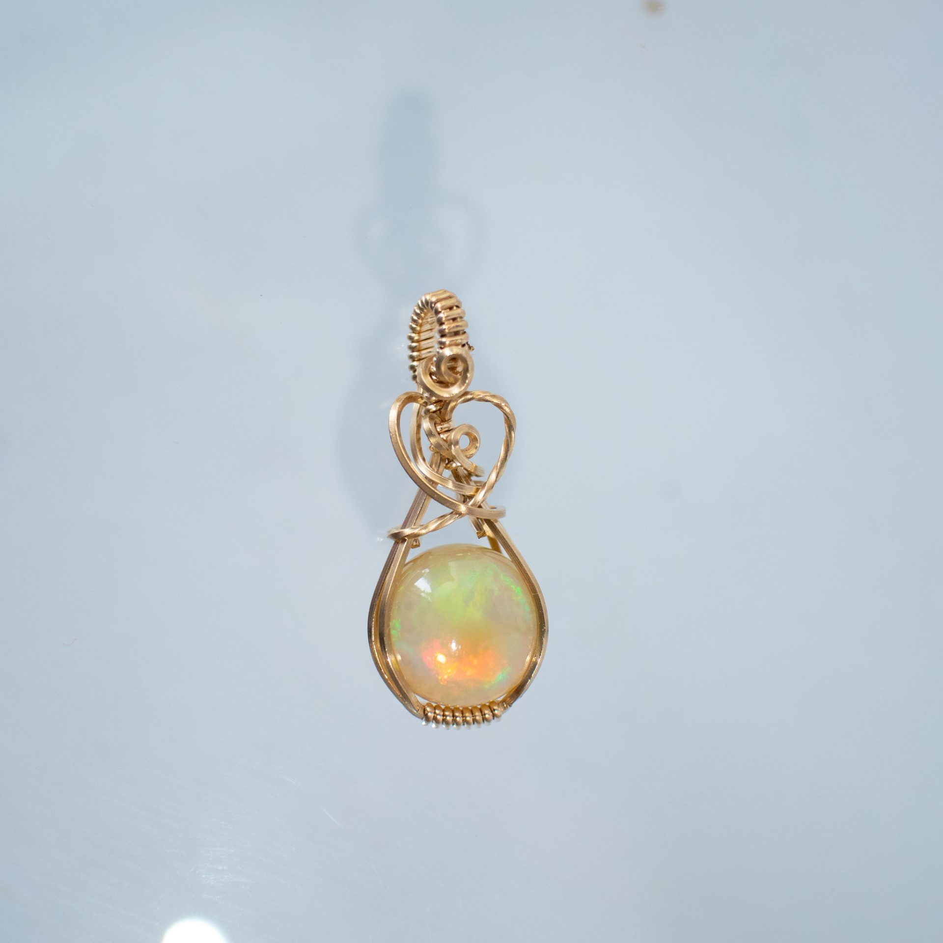 opal golden pendant