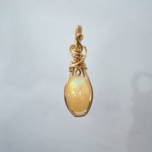 Ethiopian opal gold pendant