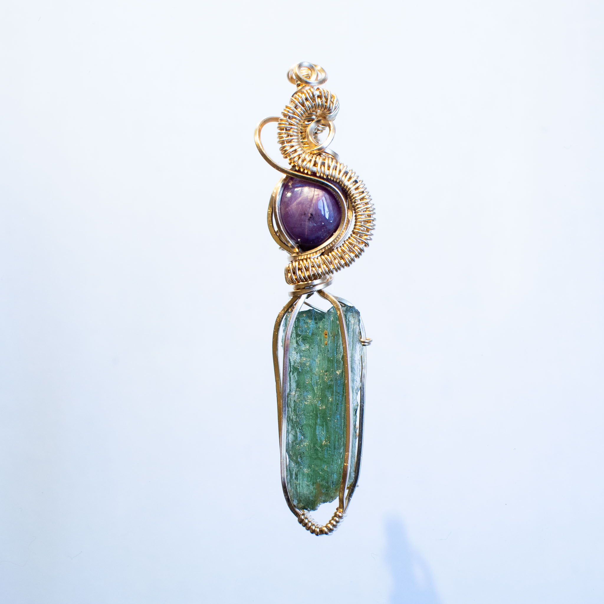 Moldavite with ruby