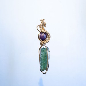 Moldavite with ruby