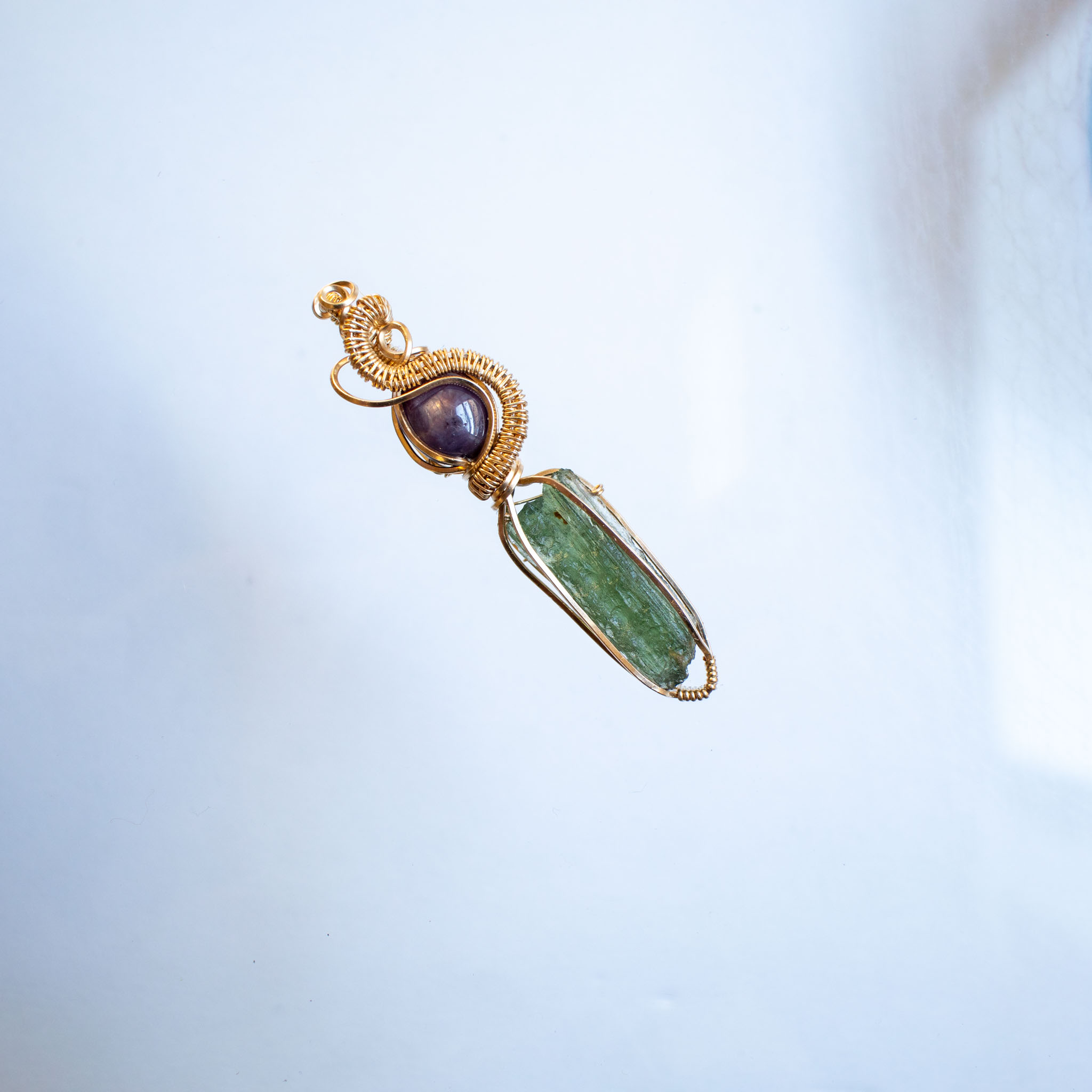 Moldavite with ruby