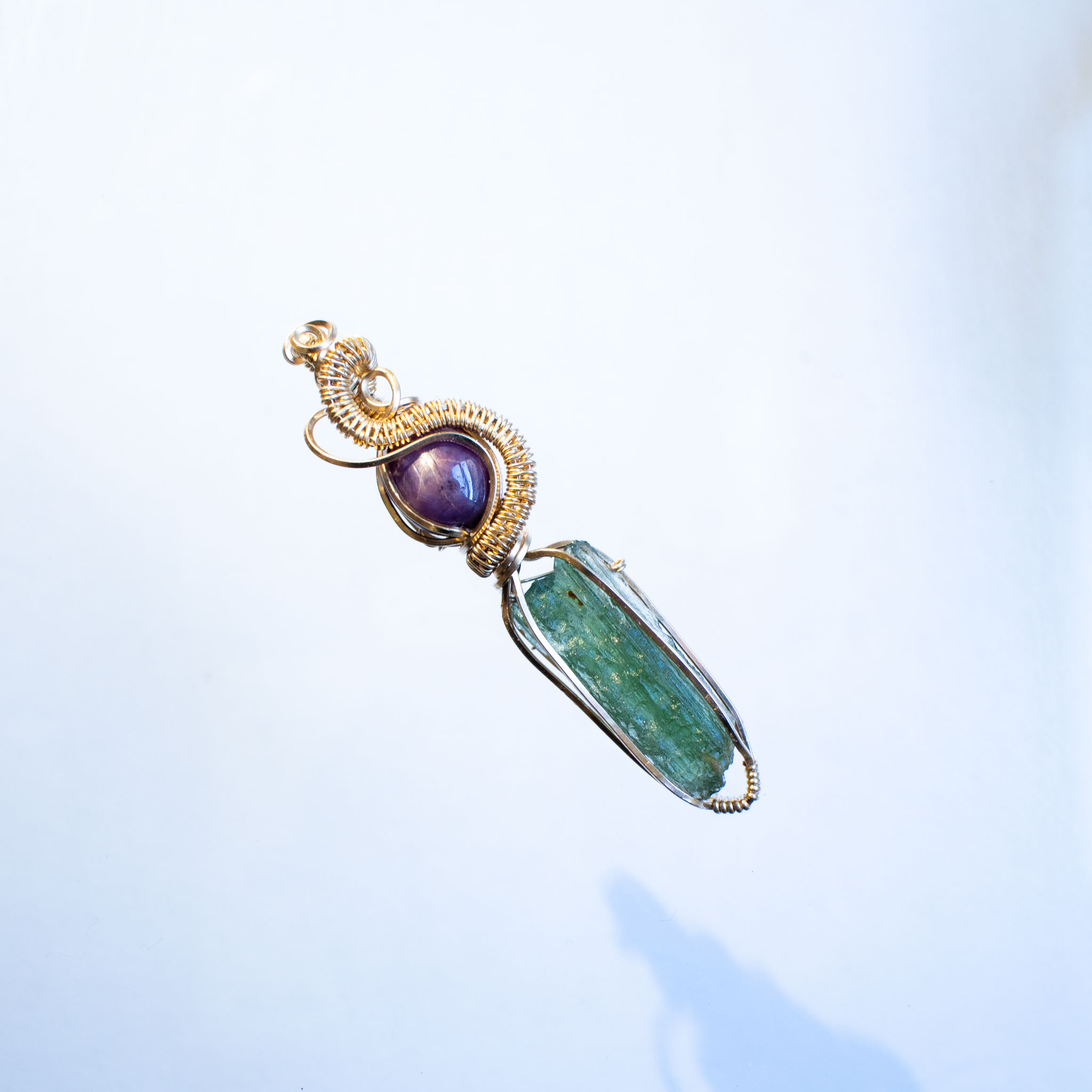 Moldavite with ruby