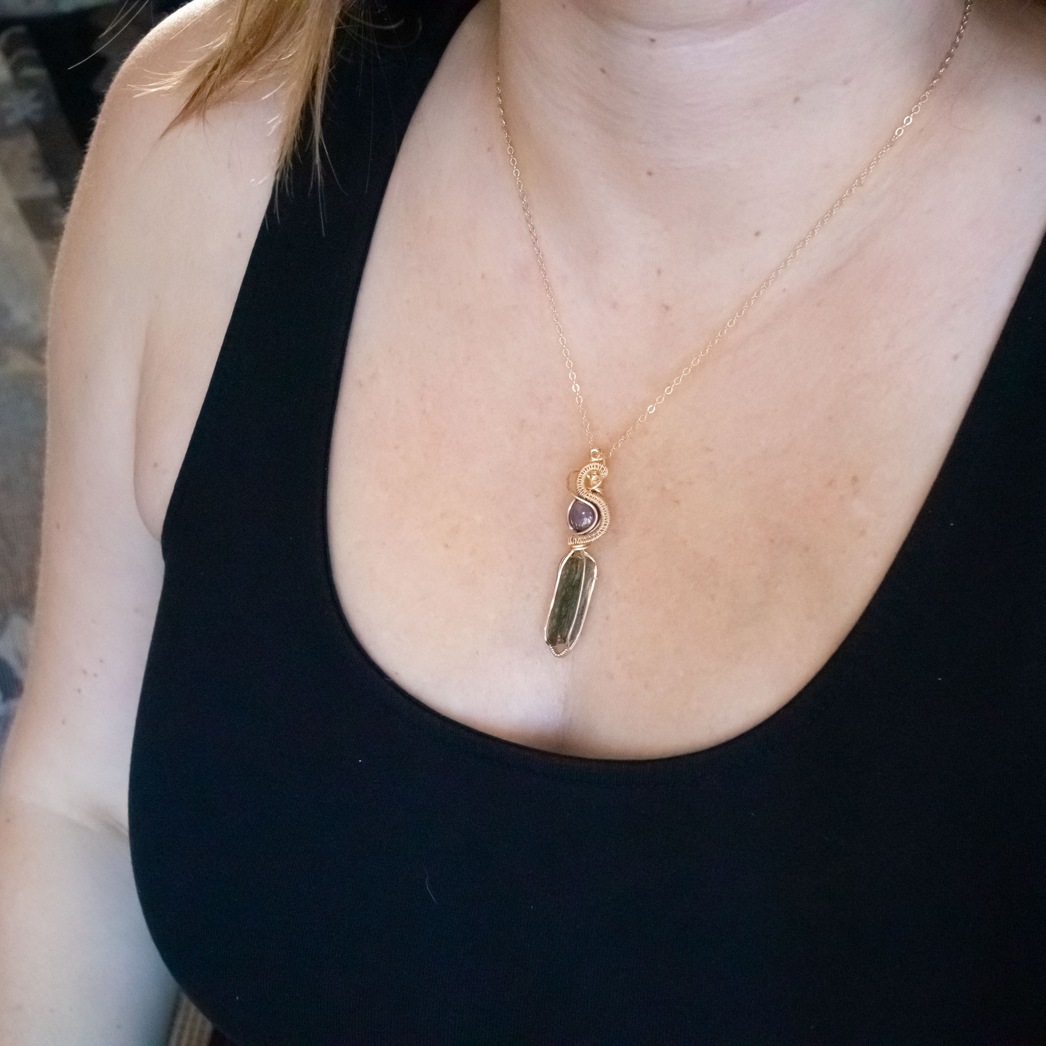Moldavite with ruby