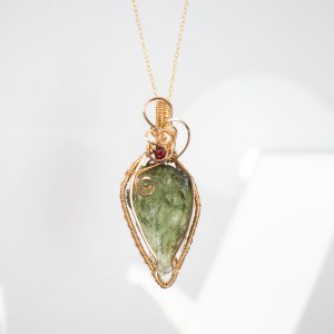 Moldavite with garnet gold pendant