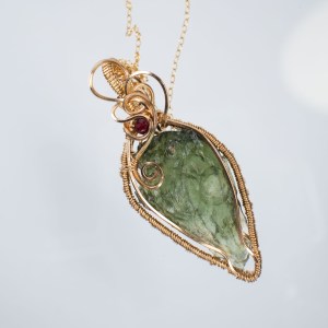 Moldavite with garnet gold pendant