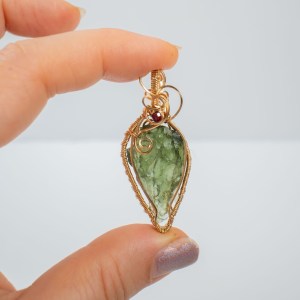 Moldavite with garnet gold pendant