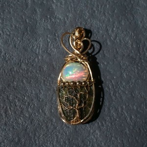 Moldavite with opal pendant