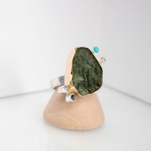 big moldavite ring with diamonds